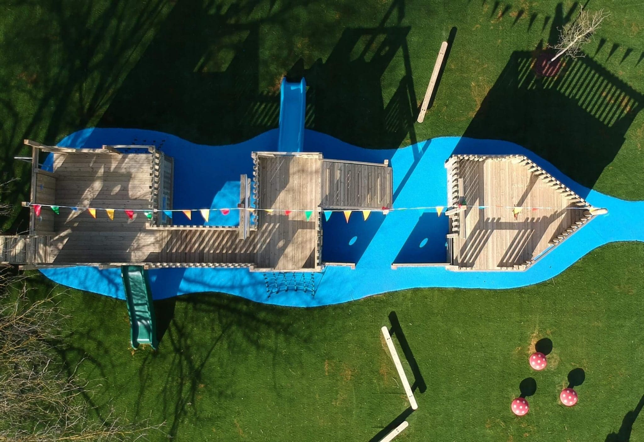 Blue wetpour water and artificial grass