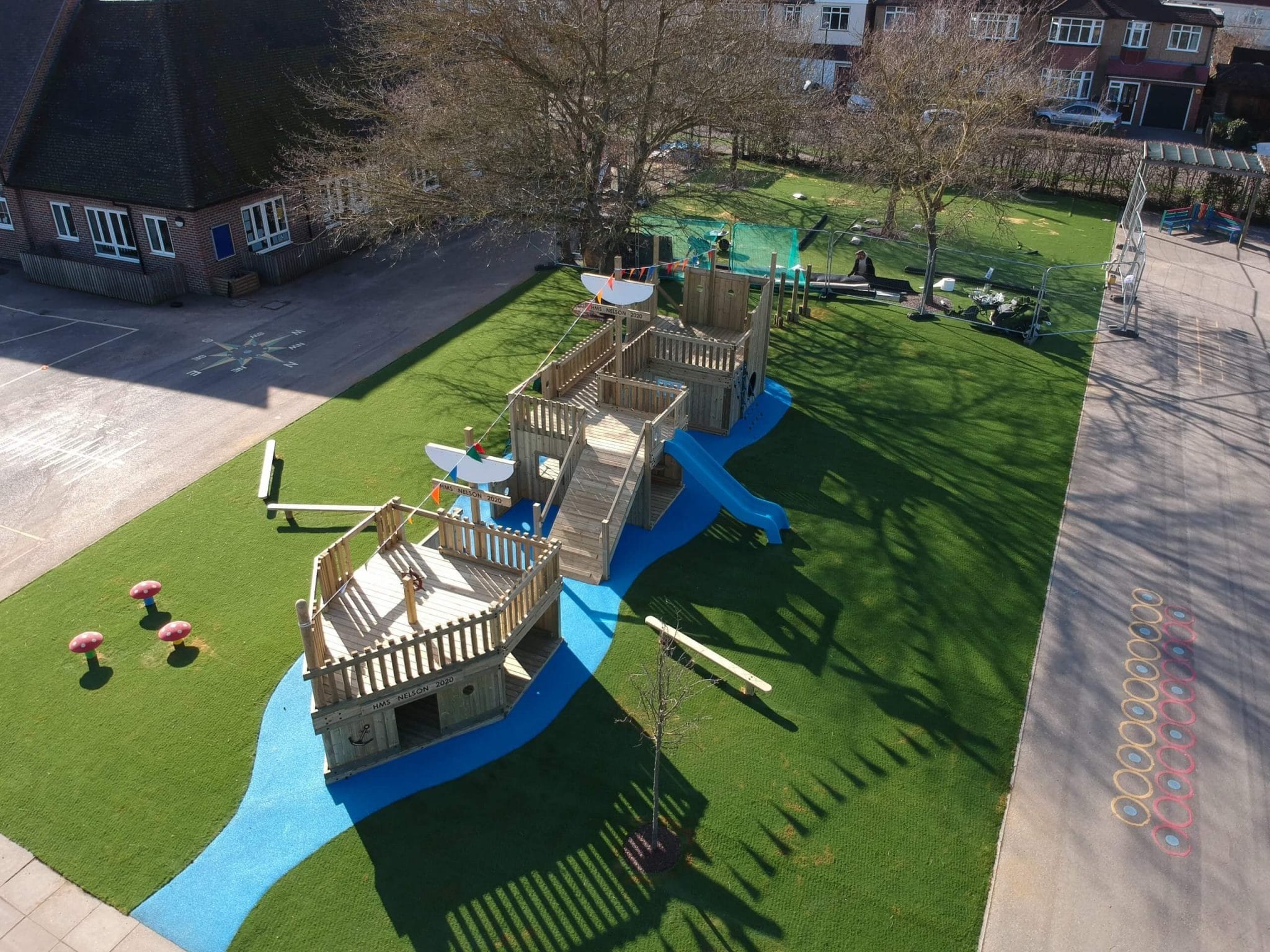 Blue wetpour water and artificial grass