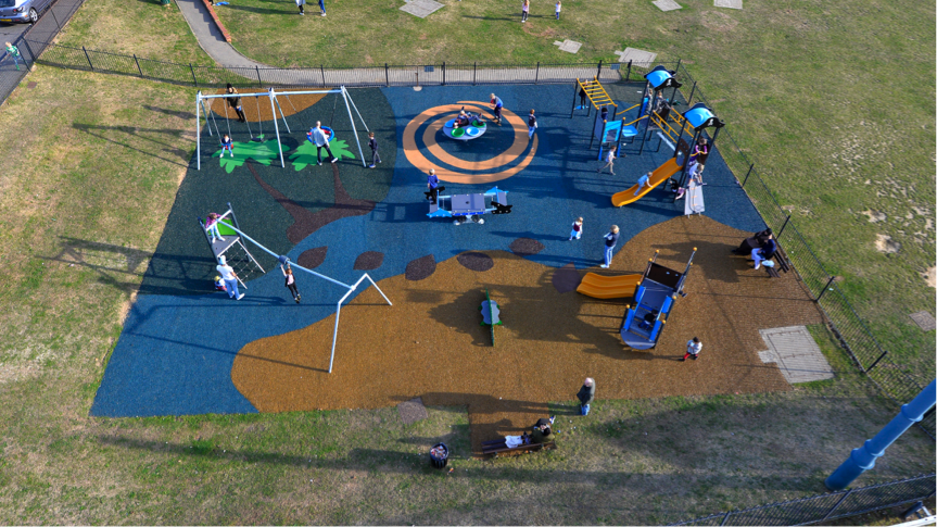 tropical island themed rubber mulch play area