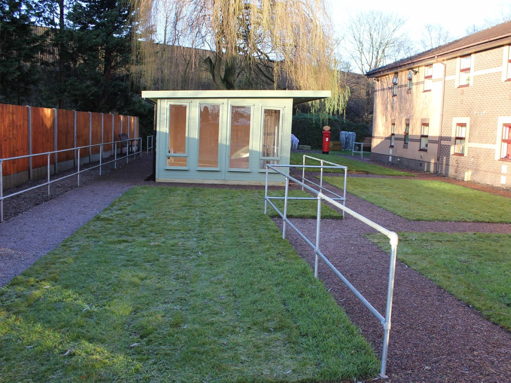 Housing with JungleMulch Pathways and accessibility fencing